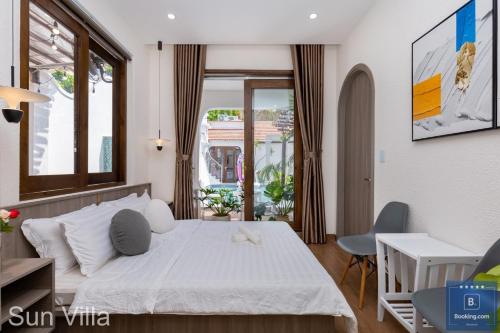Postel nebo postele na pokoji v ubytování Sun Villa Resort Mini - Trệt Không Lầu - Full Giải Trí