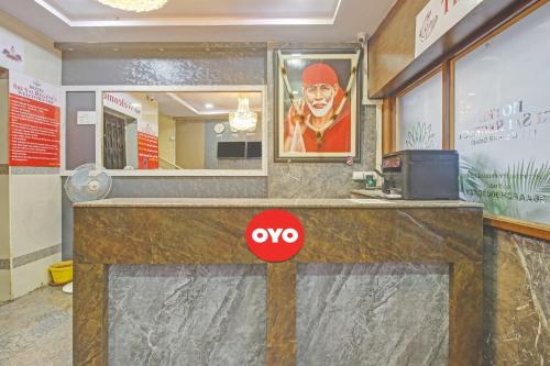 a counter in a store with a yes sign on it at Hotel O Sri Sai Regency in Hyderabad