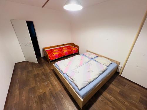 Postel nebo postele na pokoji v ubytování Ubytování kousek od Plzně