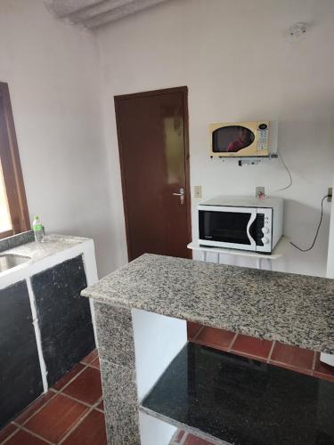 Dapur atau dapur kecil di Pousada recanto do mar torres Itapeva norte