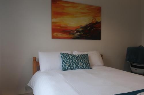 Ένα ή περισσότερα κρεβάτια σε δωμάτιο στο cozy room