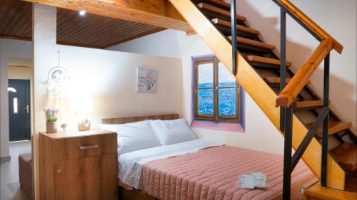A bed or beds in a room at Vavilato Home Kouramades