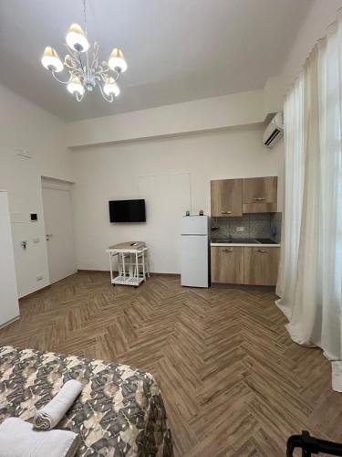 Le Suite del Lungomareにあるテレビまたはエンターテインメントセンター