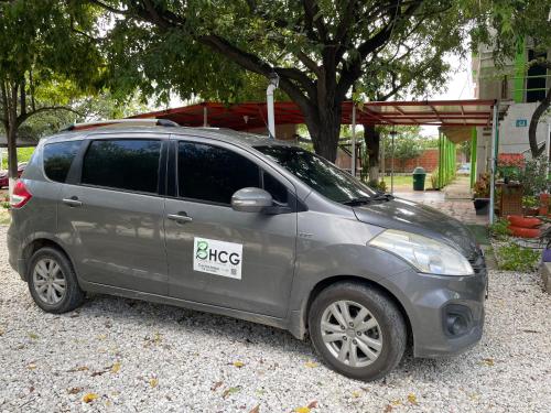 a small silver car parked in a driveway at Biohotel Caribe Green in Santa Marta