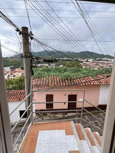 a view from a balcony of a building with roofs at Apartamento San Gil in San Gil