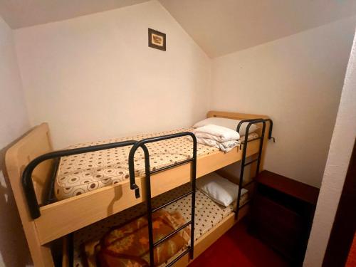 Postel nebo postele na pokoji v ubytování ECHI di Ovindoli