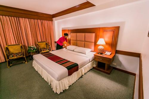 Cama o camas de una habitación en Raya Grand Hotel