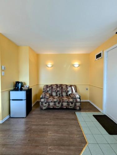 Ruang duduk di Motel des Pentes et Suites