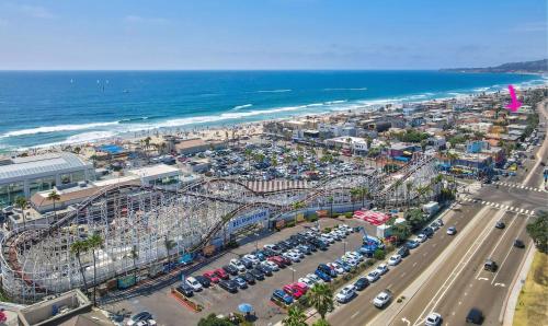 an amusement park on the beach with a roller coaster at Luna Azul, cozy condo only steps to Mission Beach! Free Internet in San Diego