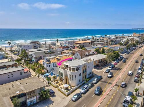 an aerial view of a city with the ocean at Luna Azul, cozy condo only steps to Mission Beach! Free Internet in San Diego