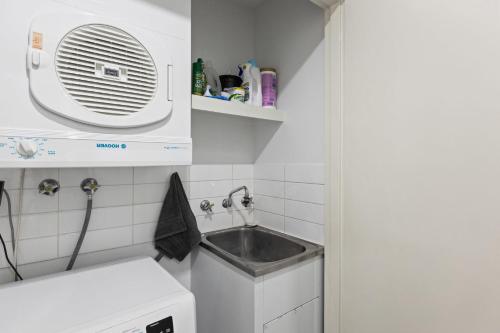 Kuchyň nebo kuchyňský kout v ubytování Coastal Haven at Sanctuary Resort