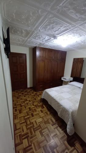 Llit o llits en una habitació de MANDALA HOSTAL CUENCA