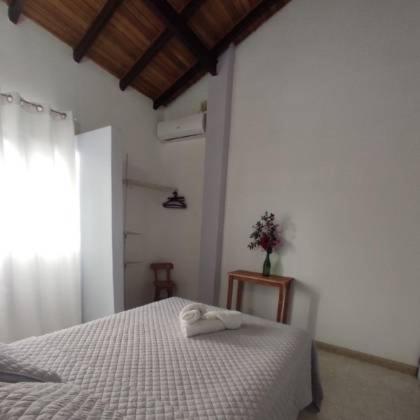 Postel nebo postele na pokoji v ubytování Quinta Xcaret