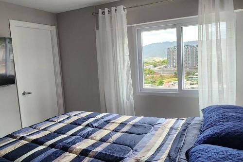 Postel nebo postele na pokoji v ubytování Apartamento con Piscina