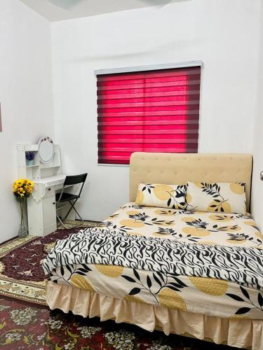 a bedroom with a bed and a window with a red shutter at Homestay Keboon Rantau Panjang in Rantau Panjang