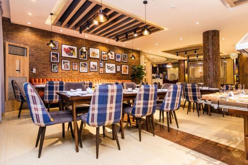 Un restaurante u otro lugar para comer en Protea Hotel by Marriott Delta