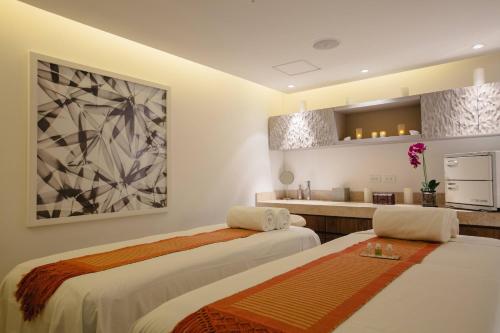 Ένα ή περισσότερα κρεβάτια σε δωμάτιο στο Cali Marriott Hotel