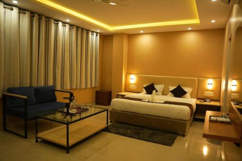 Hotel Mystic Mithilaにあるベッド