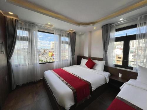 Katil atau katil-katil dalam bilik di Le Tuan Minh Hotel