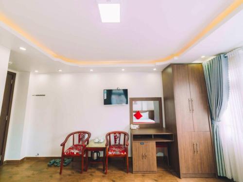 Televisyen dan/atau pusat hiburan di Le Tuan Minh Hotel