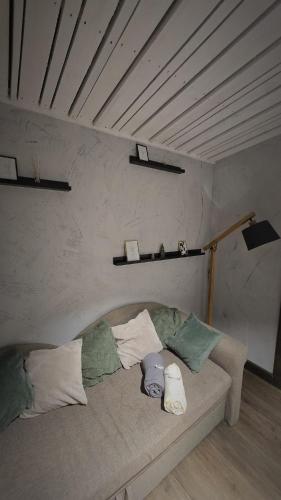 Una cama o camas en una habitación de Add Story Guest House