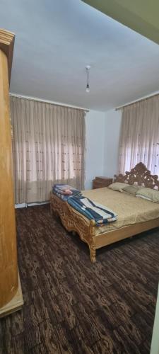 Nights of the Orient Guesthouseにあるベッド