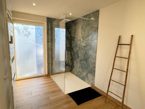 Postel nebo postele na pokoji v ubytování Les Confiseries, appartement 2 pièces et terrasse