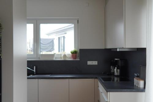 Kuchyň nebo kuchyňský kout v ubytování Ferienwohnung Martinsesch