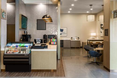 a lobby of a store with a cash register at Delta Hotels by Marriott Ontario Airport in Ontario