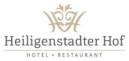 a logo for a hotel and restaurant at Hotel-Restaurant Heiligenstadter Hof in Heiligenstadt