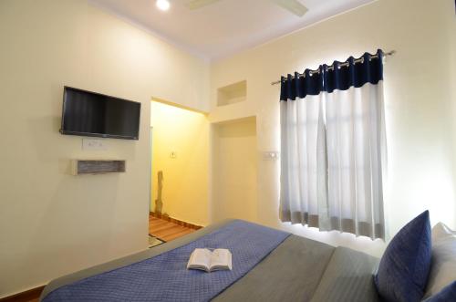 Katil atau katil-katil dalam bilik di Shalom Backpackers Udaipur