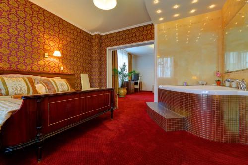 Posteľ alebo postele v izbe v ubytovaní Hotel Chabrowy Dworek