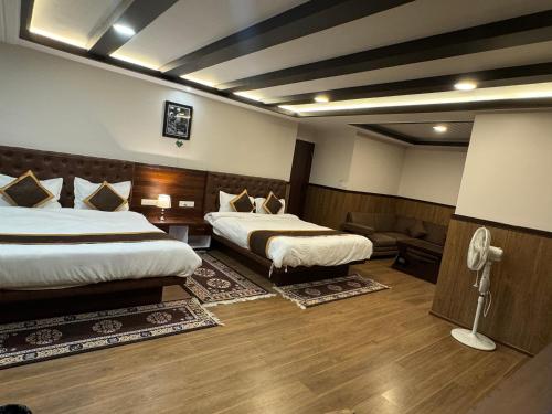 Cama o camas de una habitación en Hotel Lha-yul nearby MG Road Gangtok