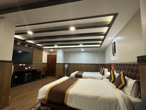 Μια τηλεόραση ή/και κέντρο ψυχαγωγίας στο Hotel Lha-yul nearby MG Road Gangtok