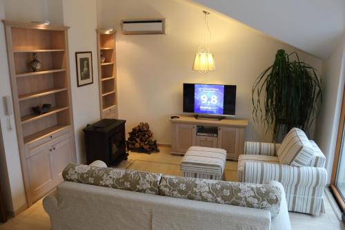Μια τηλεόραση ή/και κέντρο ψυχαγωγίας στο Apartment MiraMare