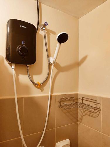 a camera is attached to the wall of a bathroom at 319 Tower 4 Avida Atria Iloilo Comfy Cozy Central Studio Unit in Iloilo City