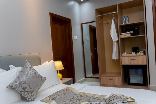 Ένα ή περισσότερα κρεβάτια σε δωμάτιο στο Adden City View Hotel