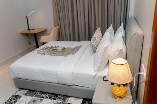 Ένα ή περισσότερα κρεβάτια σε δωμάτιο στο Adden City View Hotel