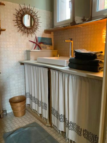 Køkken eller tekøkken på La chambre aux livres