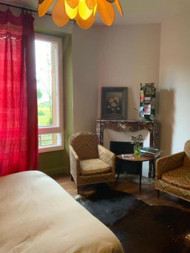 En eller flere senge i et værelse på La chambre aux livres