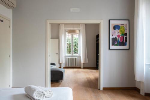 Postel nebo postele na pokoji v ubytování RRRapido Holy Suites and Rooms - Via Sardegna