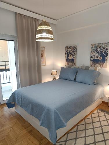Ένα ή περισσότερα κρεβάτια σε δωμάτιο στο Elegant Renovated 3-bedroom appartment in Maroussi