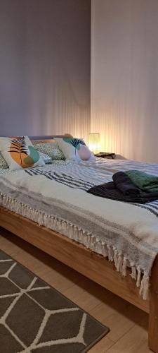 Postel nebo postele na pokoji v ubytování Siedlisko TomaszEwka