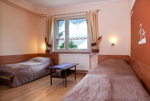 Posteľ alebo postele v izbe v ubytovaní Guest House Wanda