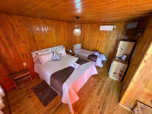 Postel nebo postele na pokoji v ubytování Quinta da Soliran Chalés Rural