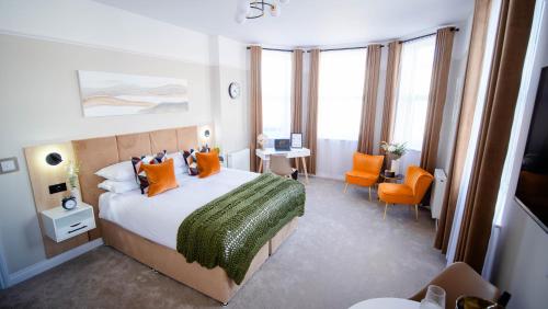Ένα ή περισσότερα κρεβάτια σε δωμάτιο στο Apart Hotel Rugby -Self Check In-