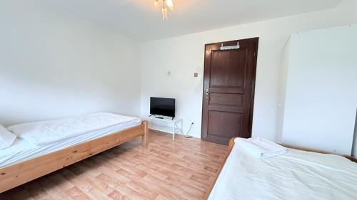 Postel nebo postele na pokoji v ubytování Monteur Unterkunft Itzehoe freistehendes Haus mit Garten & WLAN