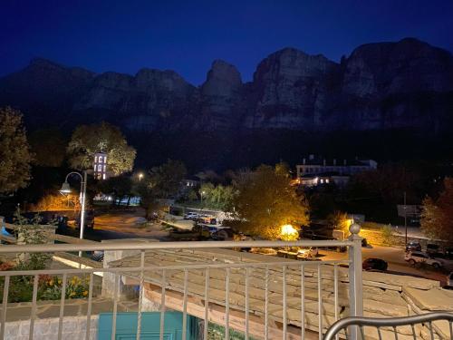 a view of a parking lot with mountains in the background at MAKRIS Papigo Luxury suites in Papigko