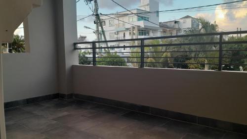 a balcony with a view of a building at Chetty Tourist Residence in Pereybere