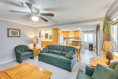 a living room with a couch and chairs and a table at Snowshoe Condo with Mtn Views, Walk to Ski Lift in Snowshoe